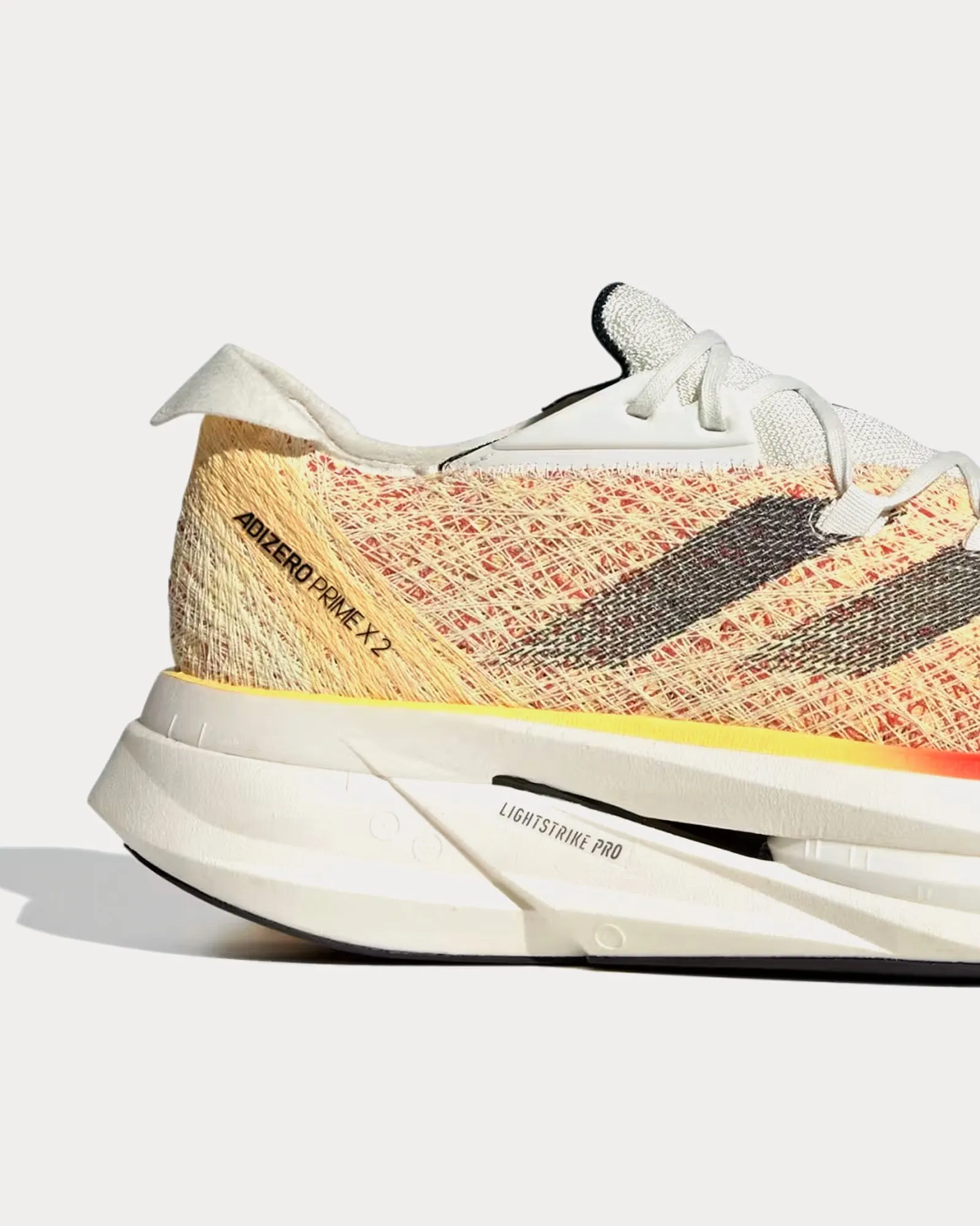 Adizero Prime X 2.0 Strung Ivory / Core Black / Spark Running Shoes